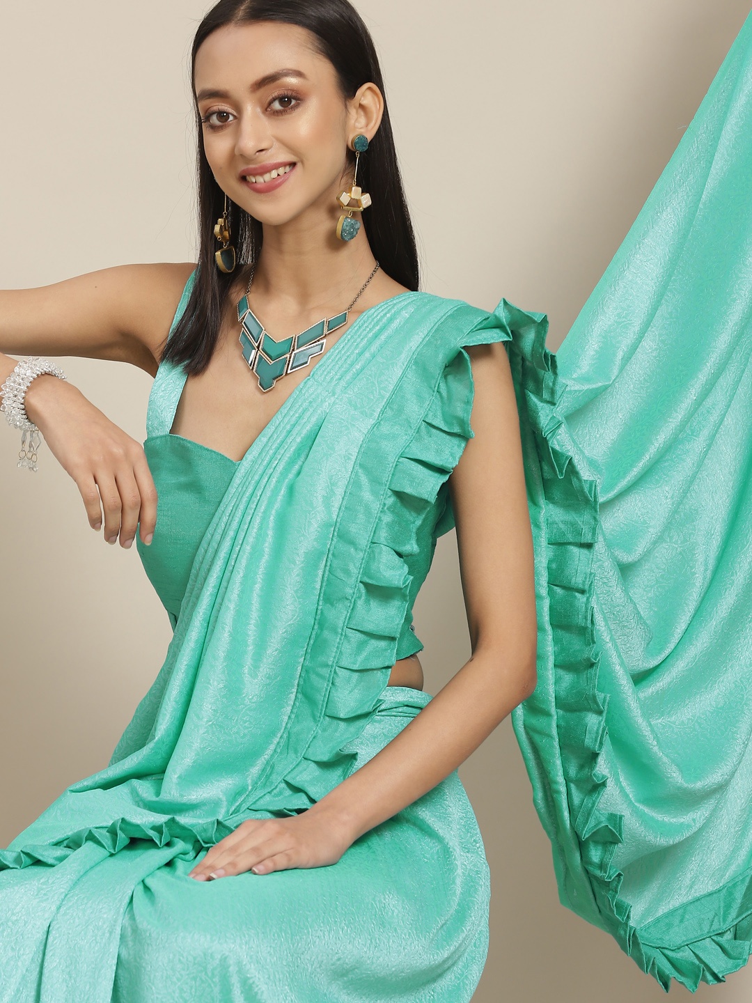 

Mitera Sea Green Ethnic Motifs Print Ready to Wear Saree