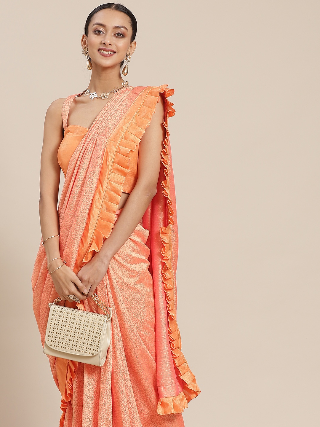 

Mitera Peach-Coloured Ethnic Motifs Brasso Ruffled Ready to Wear Saree