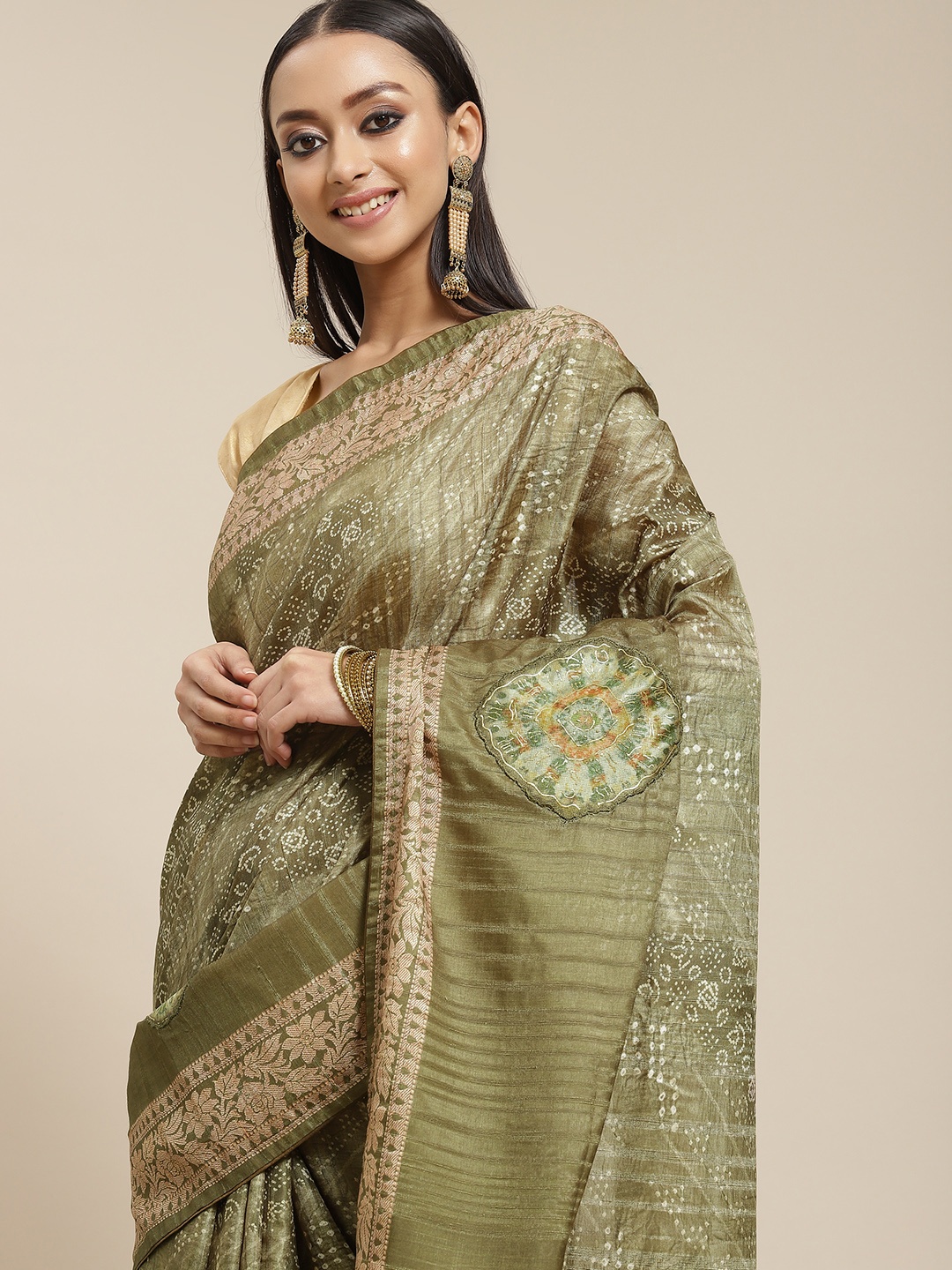 

Mitera Olive Green & Beige Ethnic Motifs Art Silk Saree
