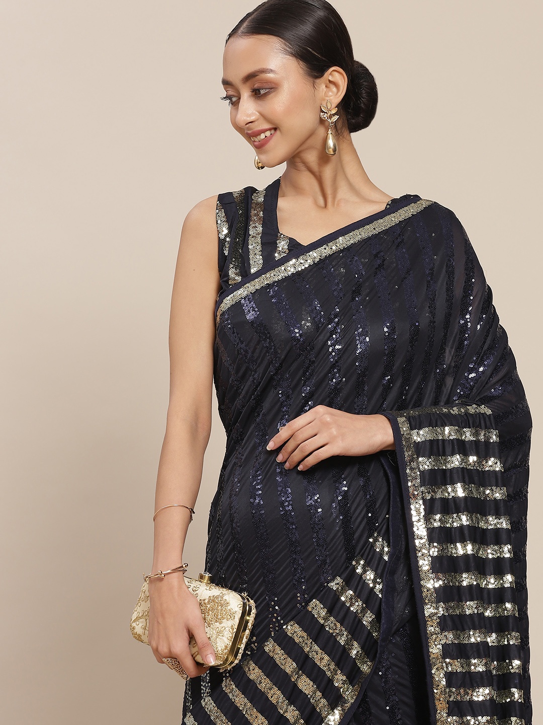 

Mitera Navy Blue & Golden Sequinned Embellished Saree