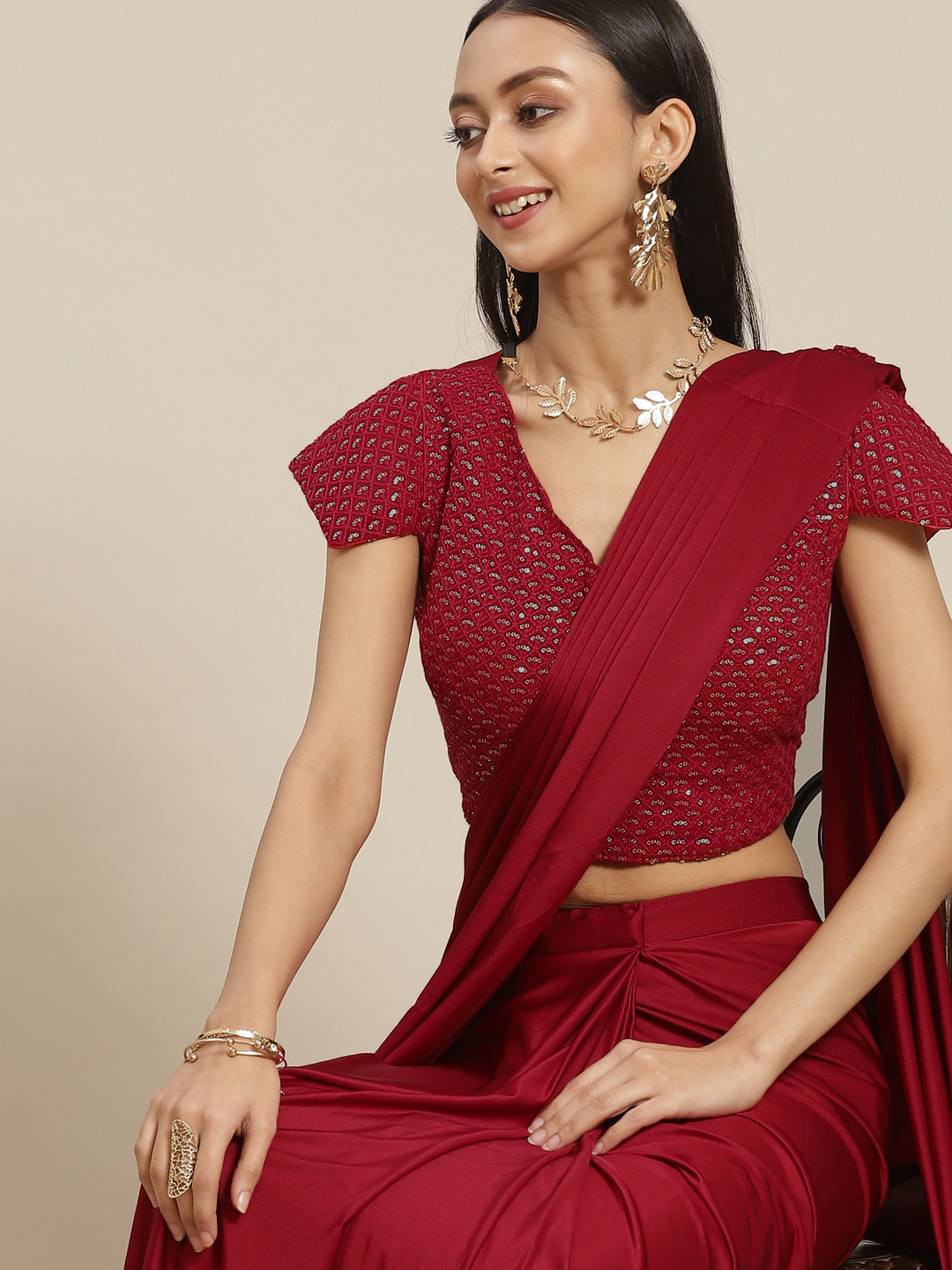 

Mitera Maroon Solid Ready to Wear Saree