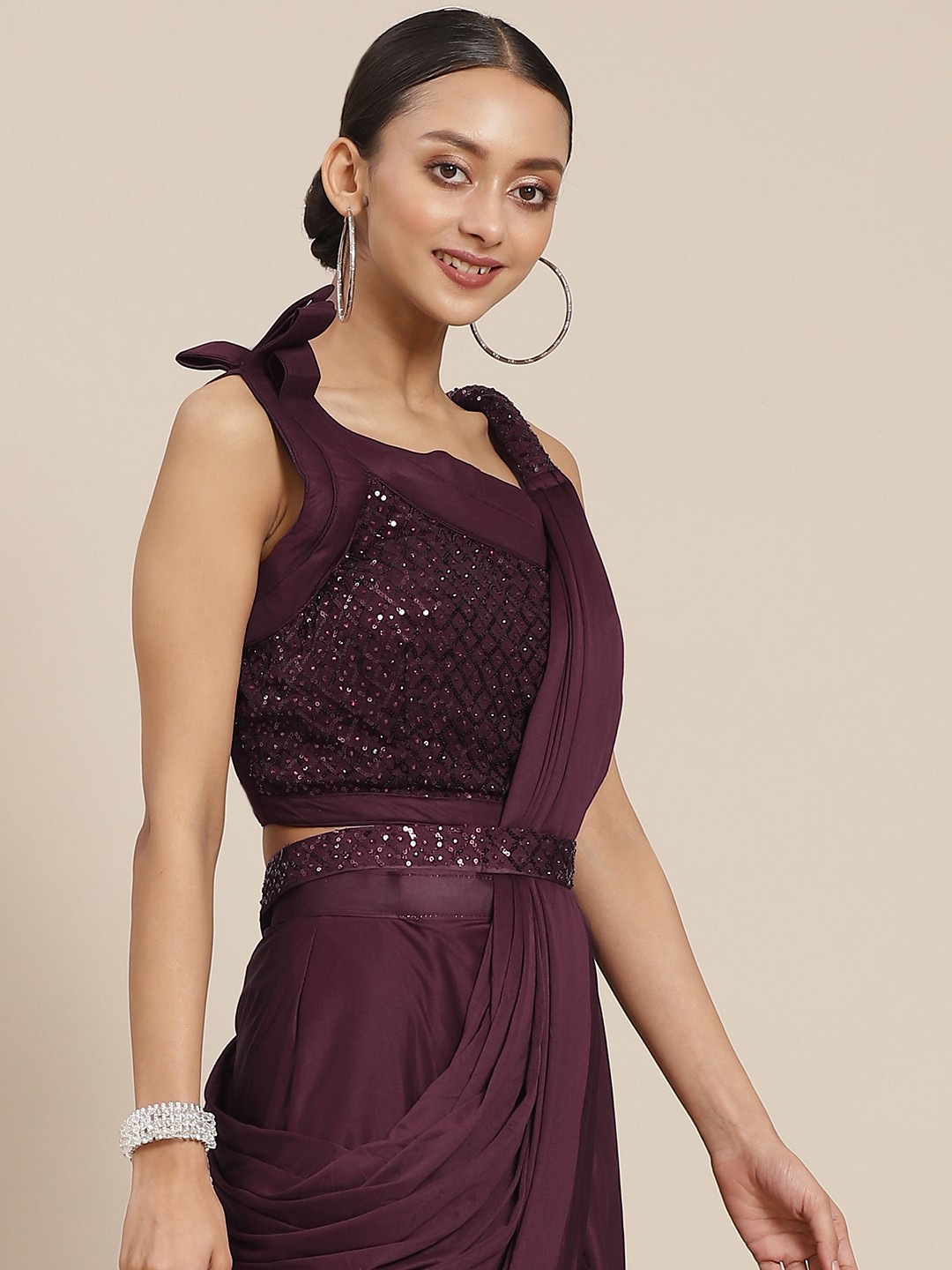 

Mitera Burgundy Solid Ready to Wear Saree