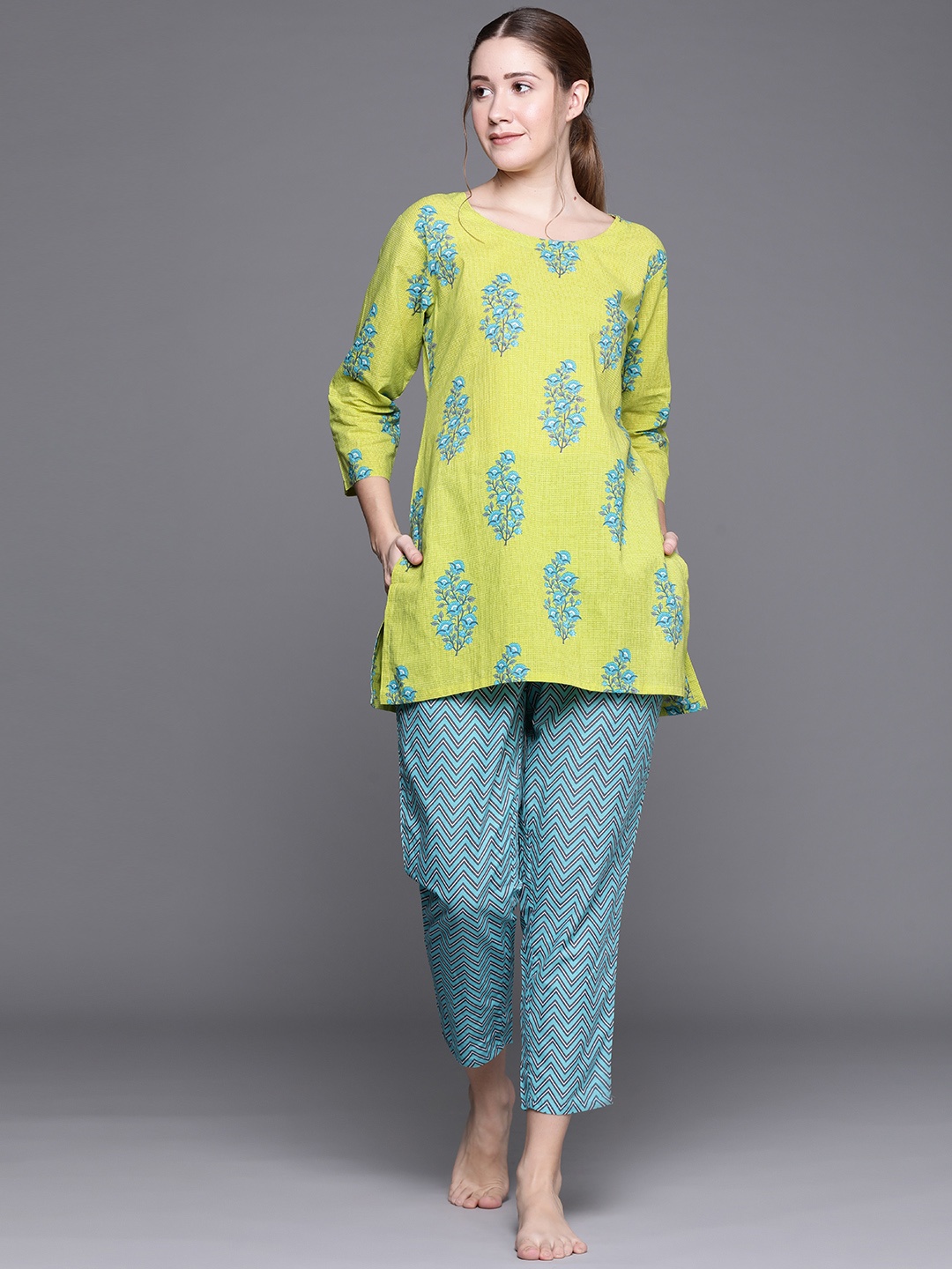 

Libas Green Cotton Printed Kurti And Blue Cotton Printed Pyjamas With Both Side Pocked