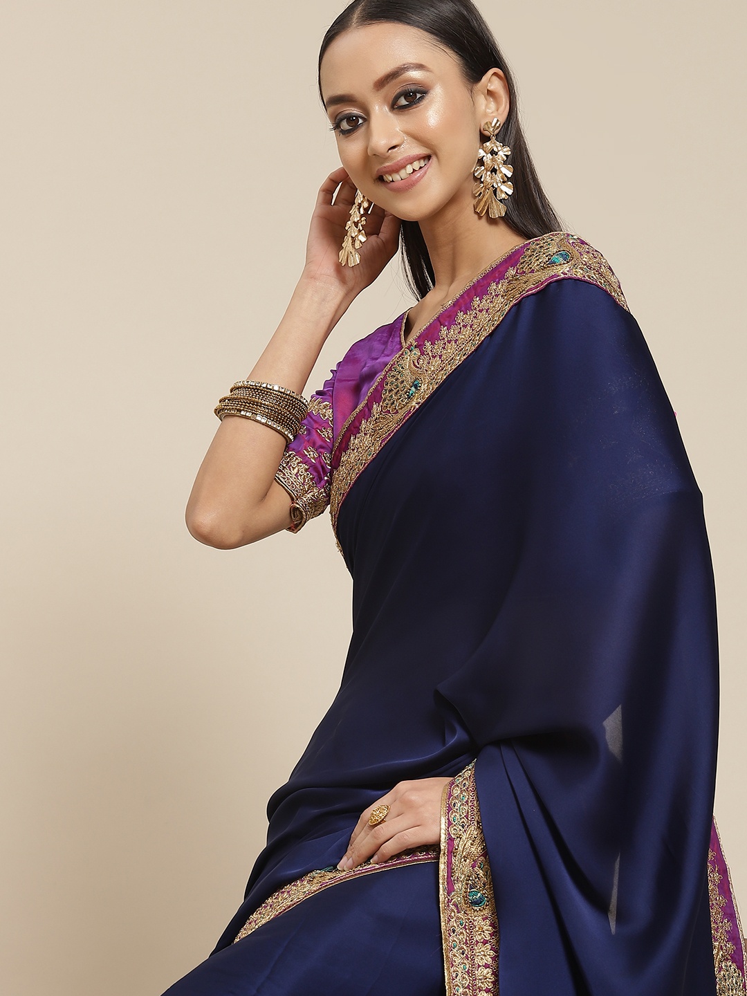 

Mitera Navy Blue Solid Saree