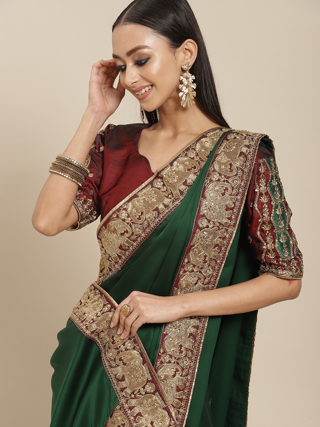 

Mitera Green & Maroon Solid Gotta Patti Saree
