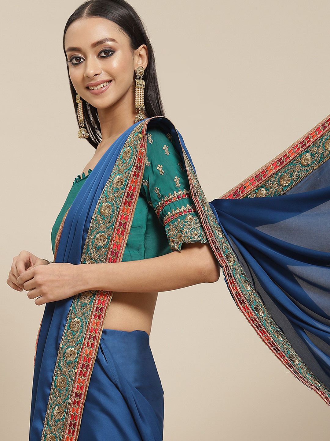 

Mitera Blue Solid Saree