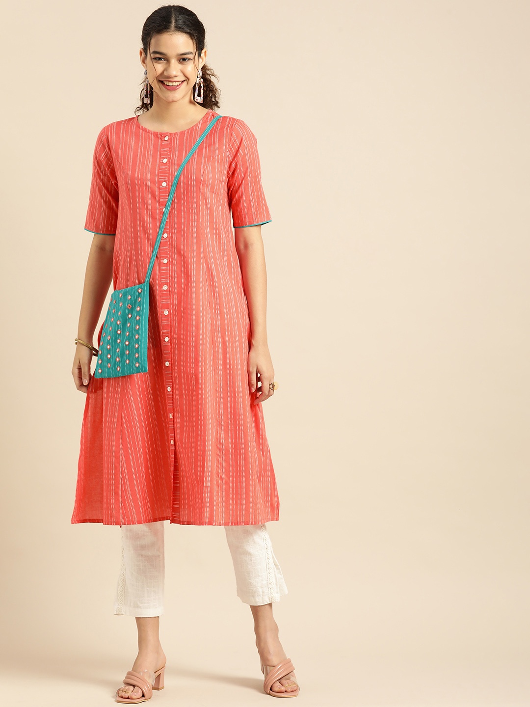 

Anouk Women Orange & White Striped Kurta with Embroidered Bag