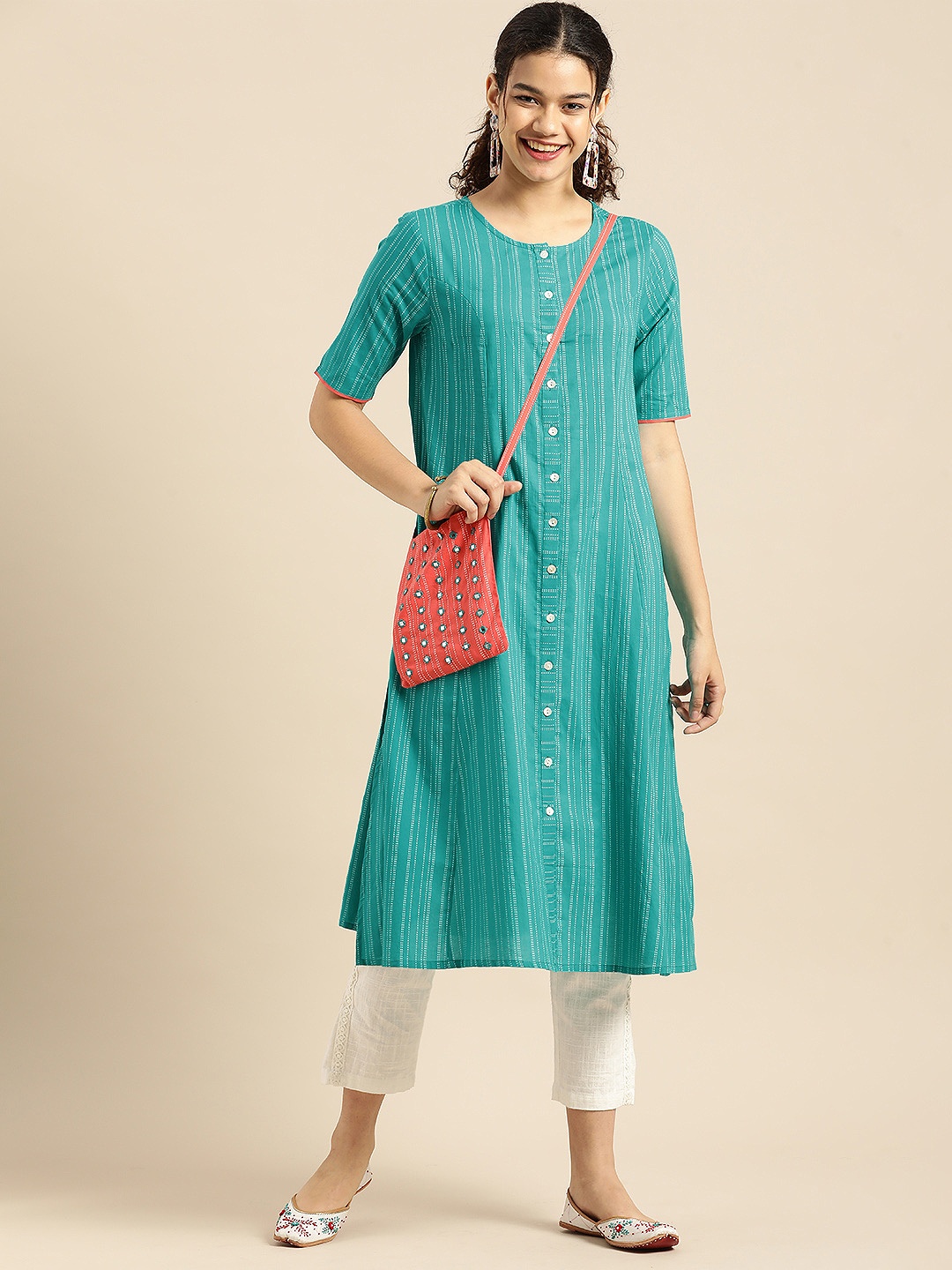 

Anouk Women Teal Blue Striped Kurta with Embroidered Bag