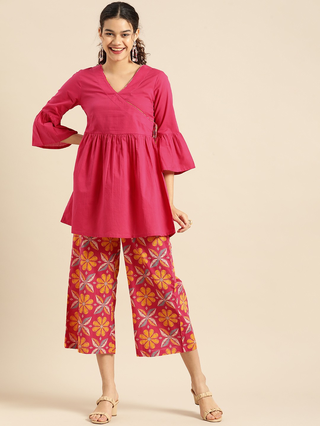 

Anouk Women Pink Solid Angrakha Pure Cotton Kurti with Palazzos