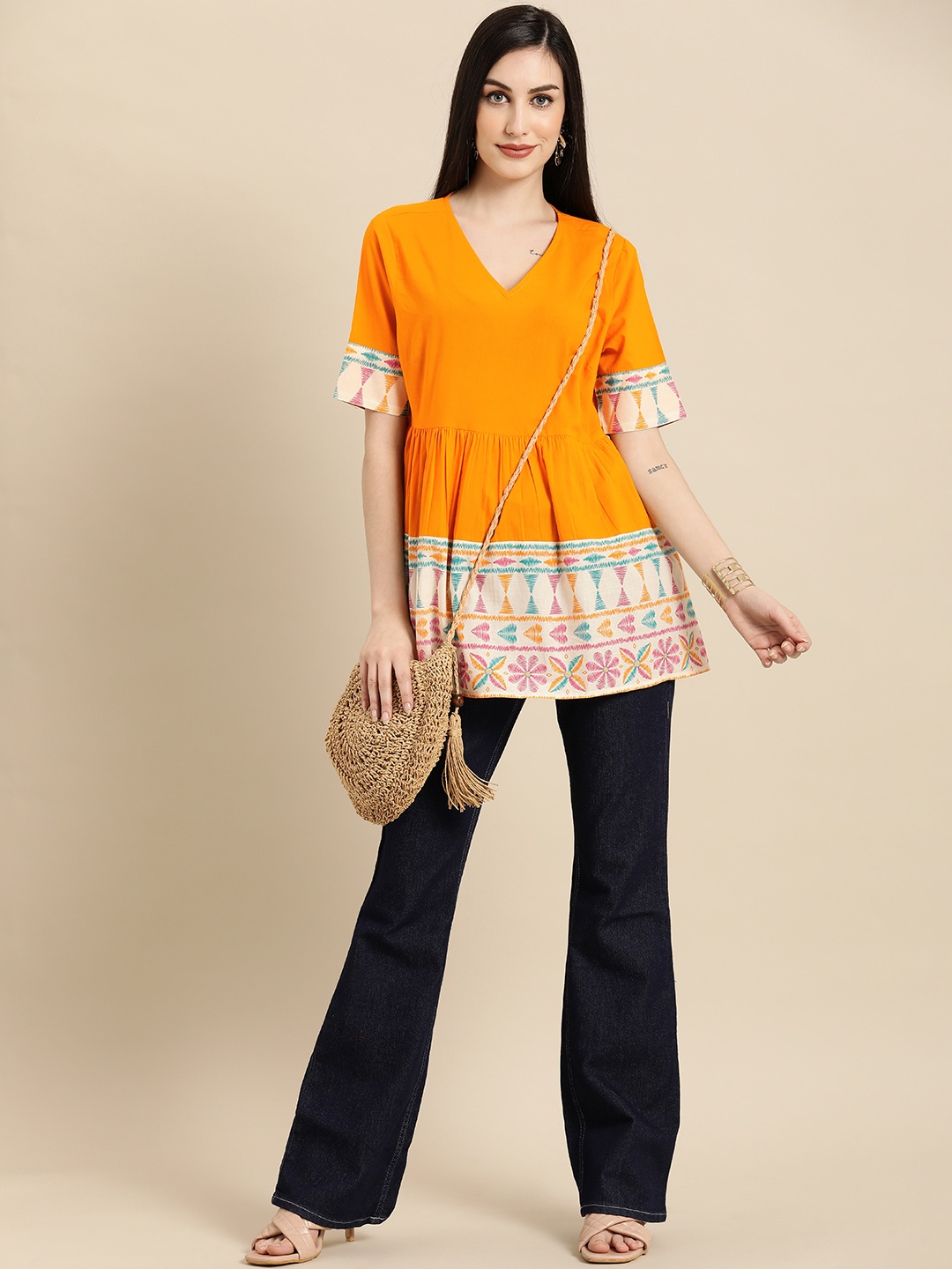 

Anouk Women Mustard Yellow & White Printed V-Neck Peplum Top