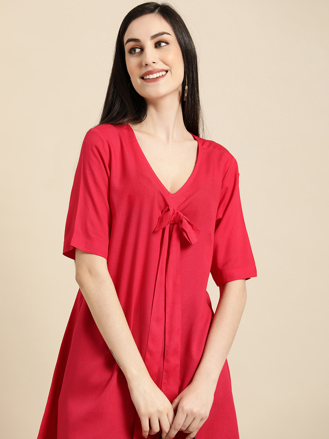

Anouk Women Red Solid V-Neck Longline Top With Tie-Up Detail