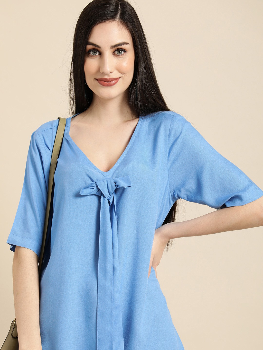 

Anouk Women Sky Blue Solid V-Neck Longline Top With Tie-Up Detail