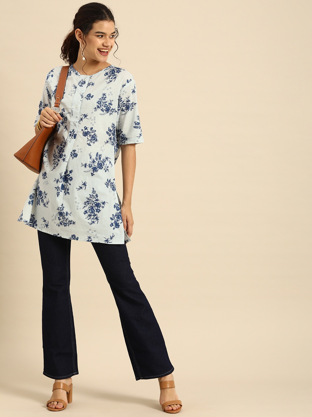 

Anouk Turquoise Blue Floral Printed Pure Cotton Round Neck Kurti