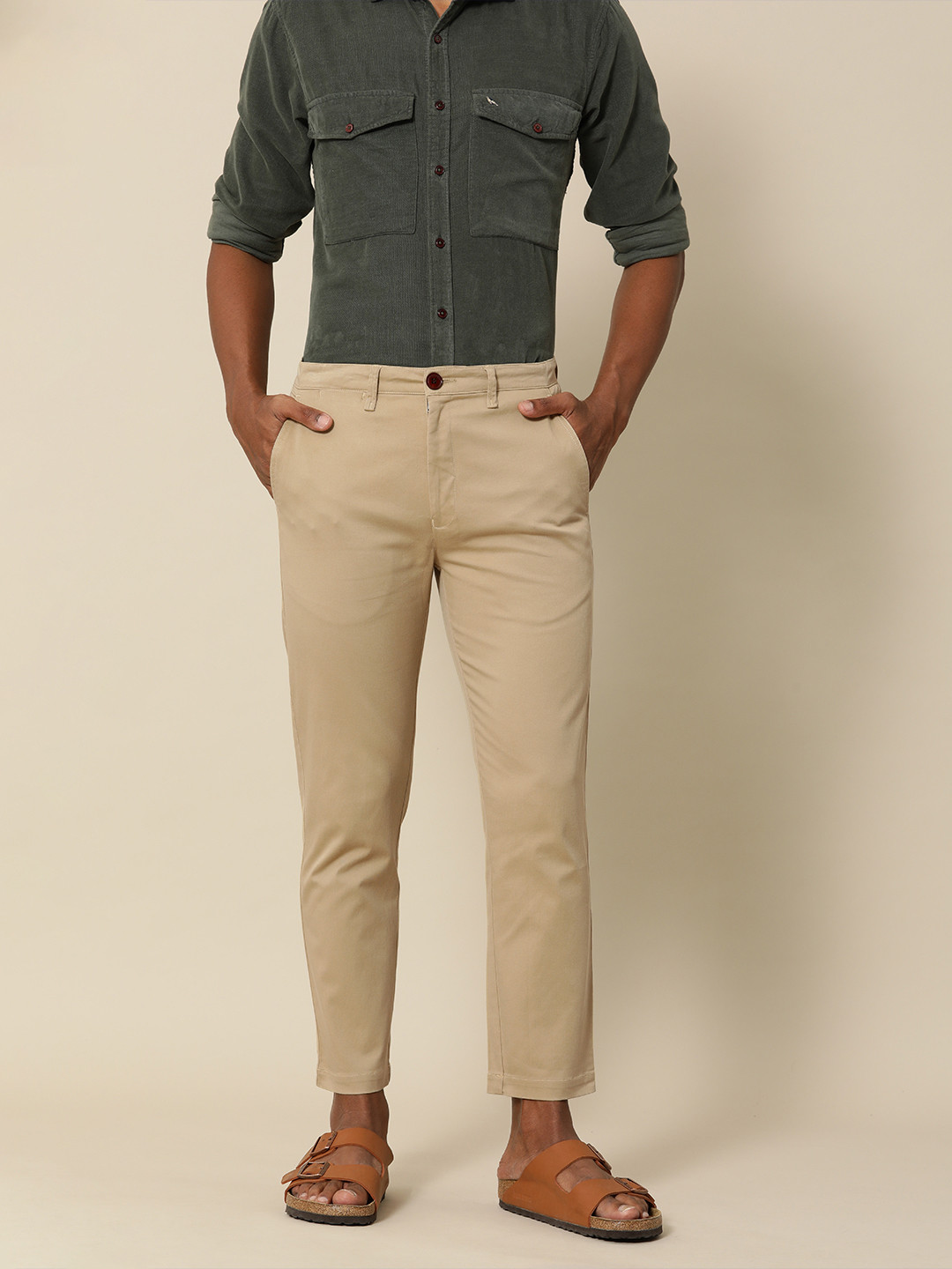 

Mr Bowerbird Men Beige Solid Tailored Fit Trousers