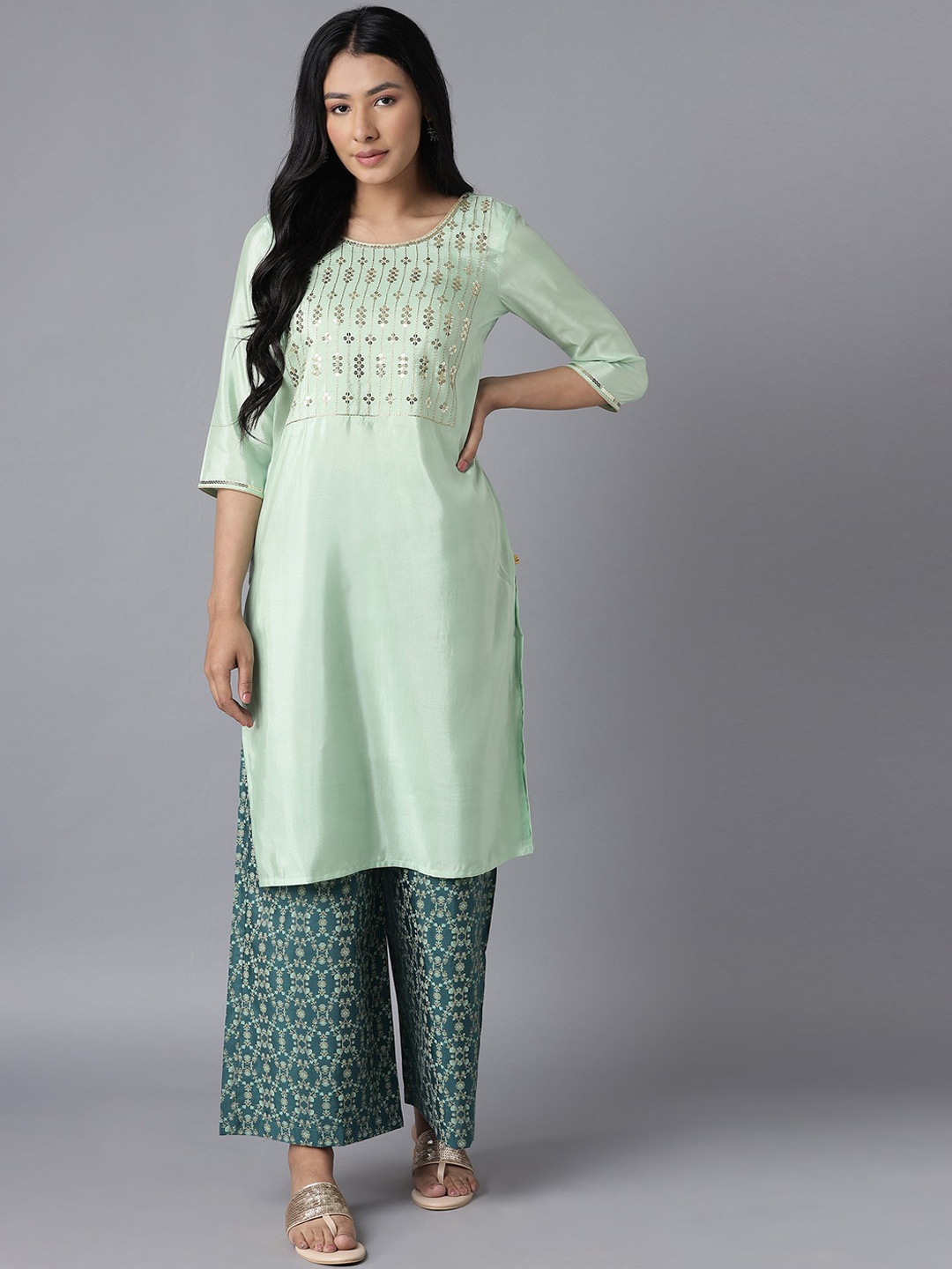

AURELIA Women Green Ethnic Motifs Embroidered Regular Kurta with Palazzos