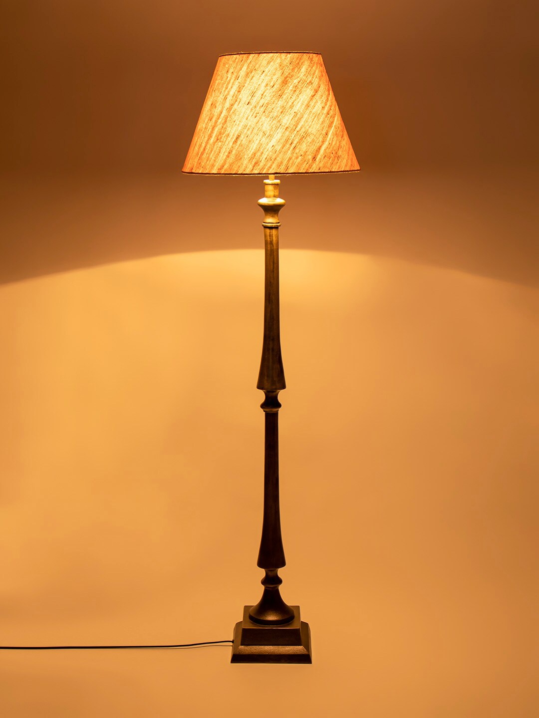 

Fabindia Bronze-Toned & Beige Solid Contemporary Floor Lamp