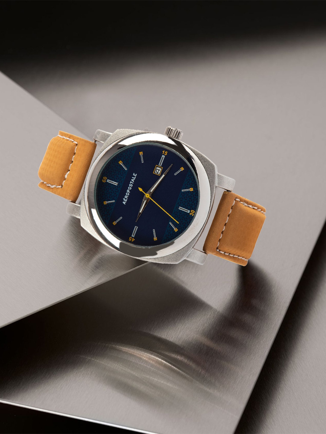 

Aeropostale Unisex Blue Brass Dial & Brown Leather Straps Analogue Watch AERO_AW_A1