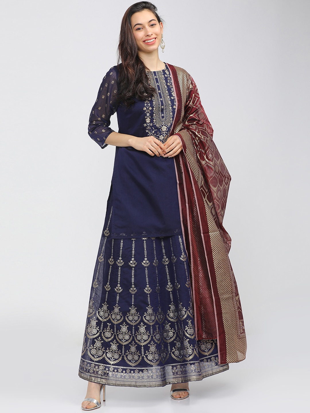 

Vishudh Women Blue & Maroon Ethnic Motifs Embroidered Regular Kurti with Skirt & Dupatta