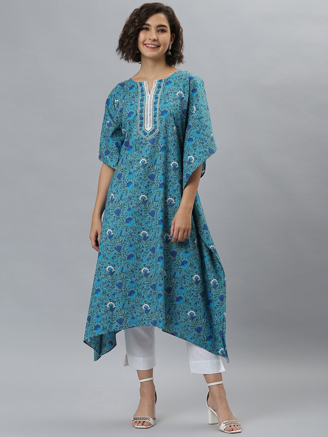 

Janasya Women Blue & White Ethnic Motifs Printed Flared Sleeves Floral Kaftan Kurta