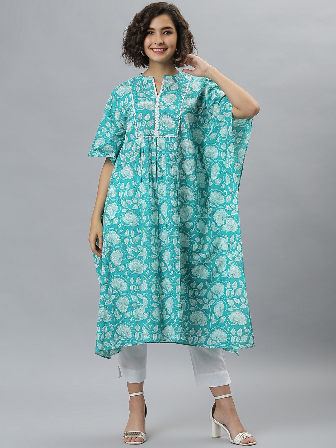 

Janasya Women Green Printed Flared Sleeves Floral Cotton Kaftan Kurta