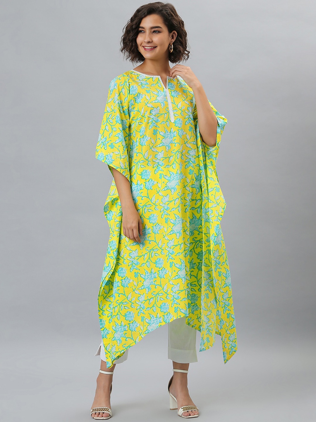 

Janasya Women Yellow & Blue Floral Printed Flared Sleeves Floral Kaftan Kurta