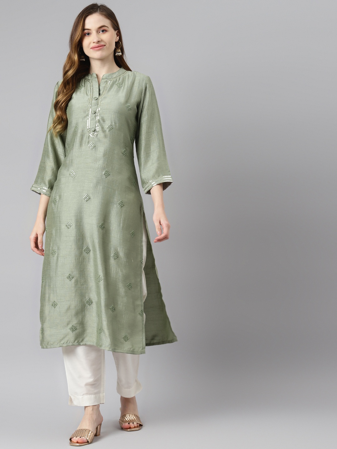 

Readiprint Fashions Women Green Geometric Embroidered Kurta