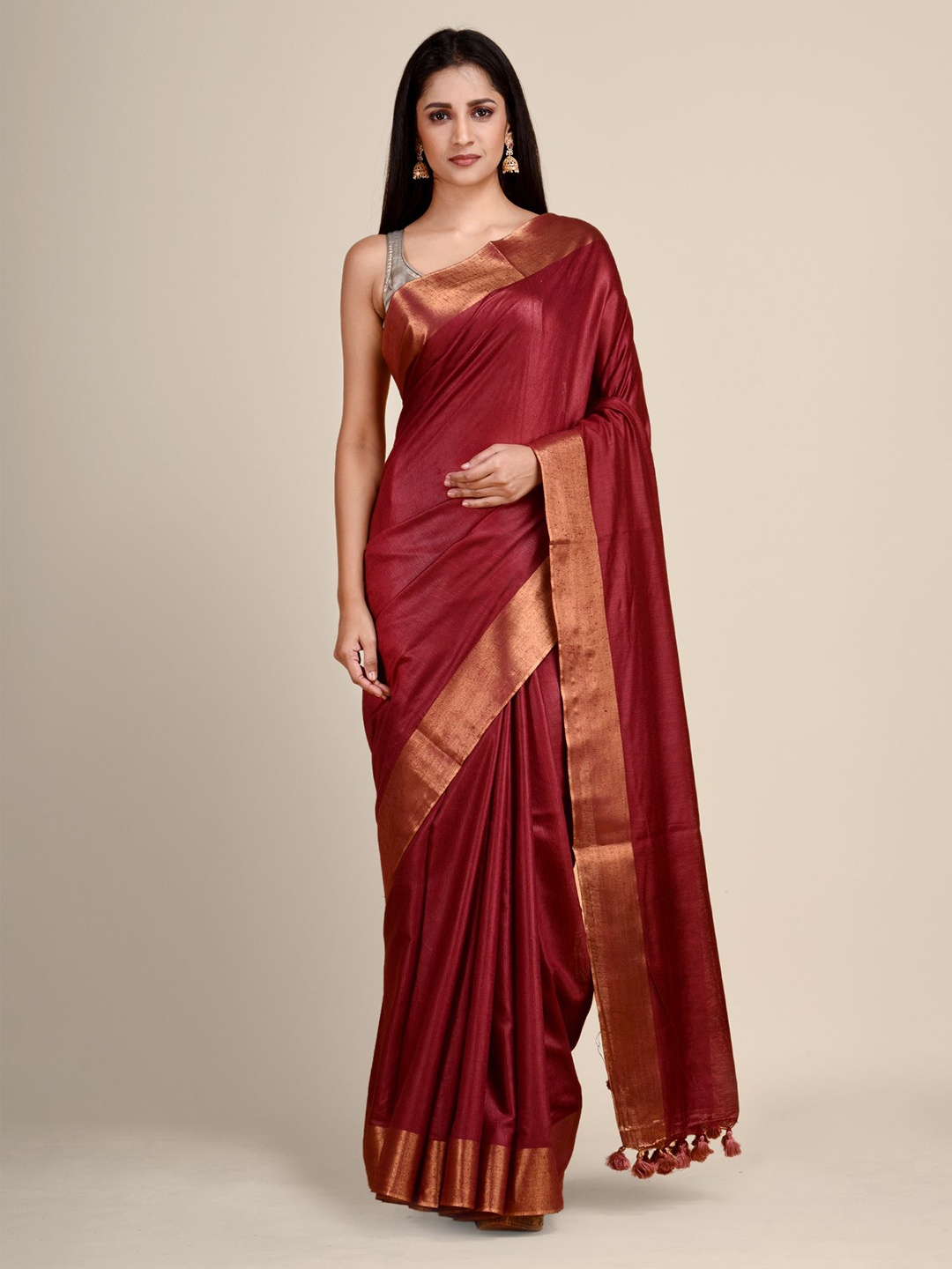 

Arhi Maroon & Gold-Coloured Zari Border Saree