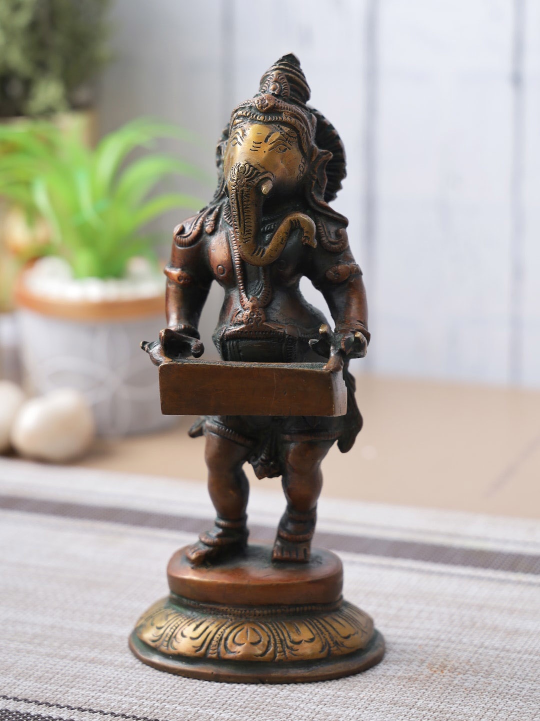 

Aapno Rajasthan Brown Lord Ganesha Idol Showpiece