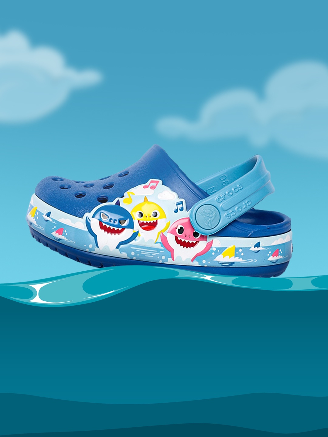 

Crocs Unisex Kids Blue Baby Shark Band Applique Croslite Clogs with Cut-Outs Detail