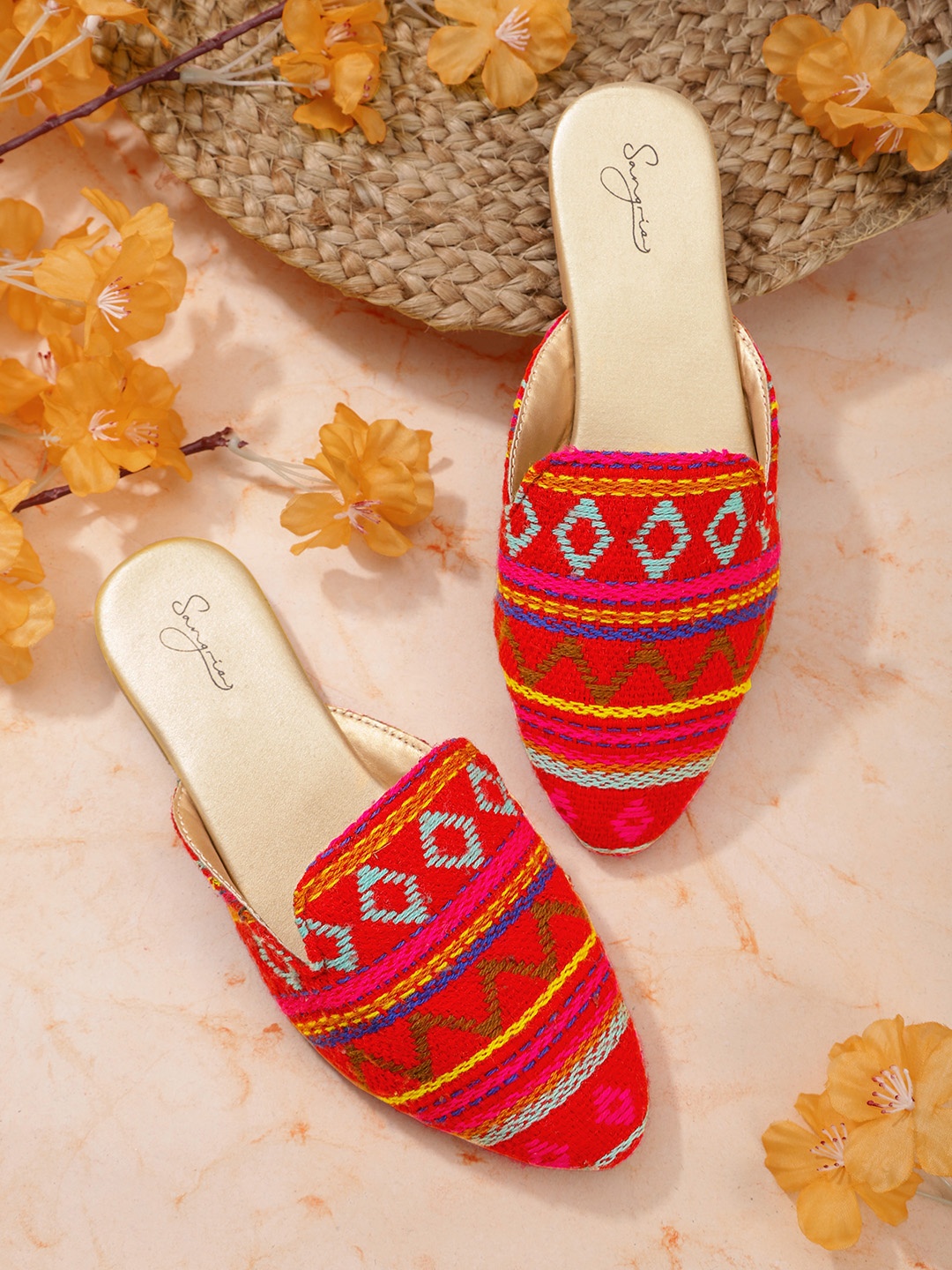 

Sangria Women Red & Pink Woven Design Mules