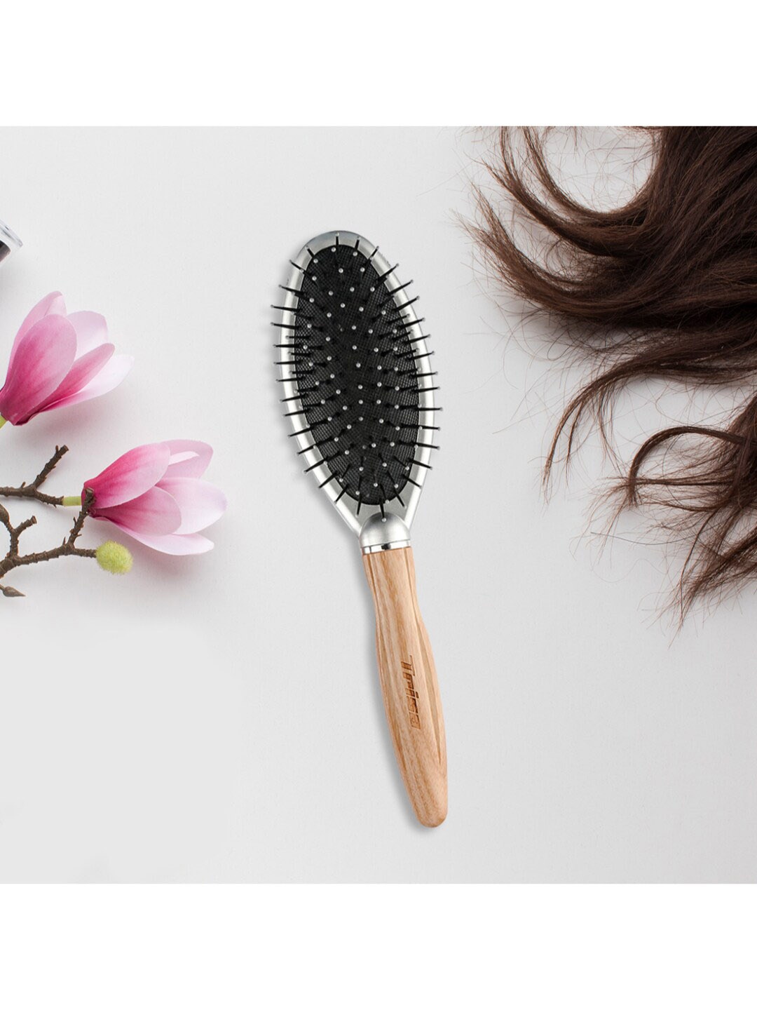 

Trisa Black Hair Brush