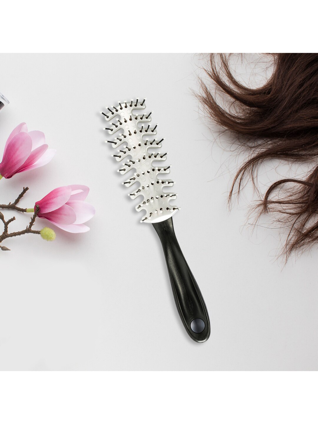 

Trisa Black & Grey Hair Brush with Synthetic Pins