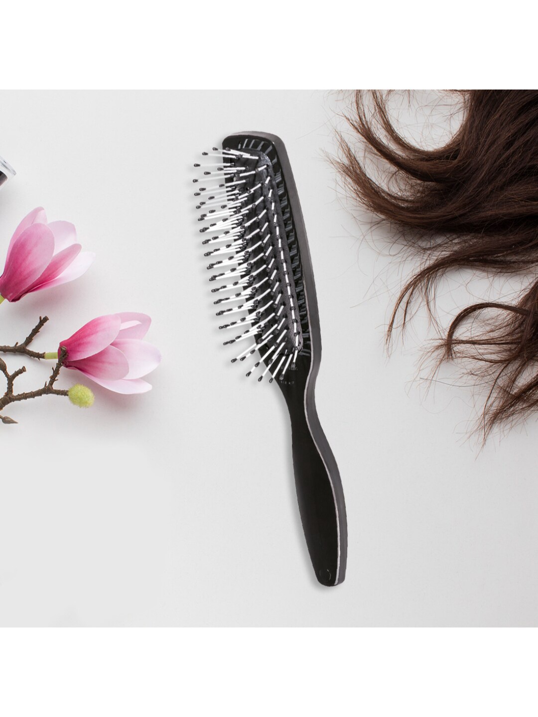 

Trisa Black Hair Brush