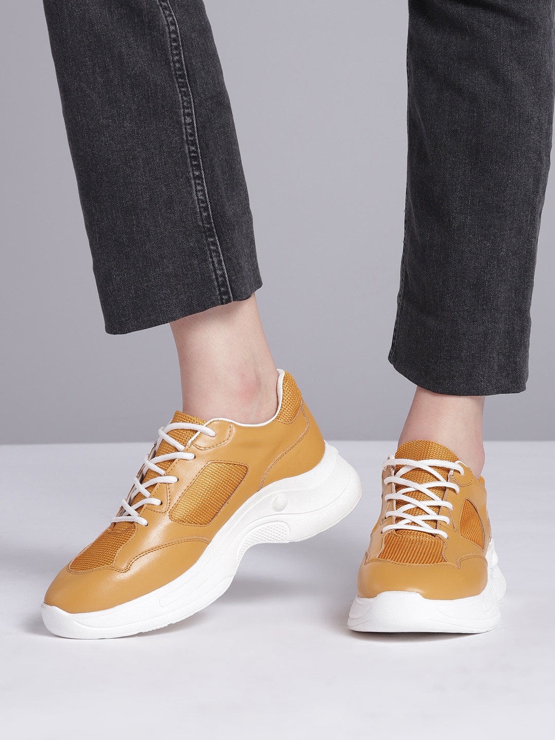

Roadster Women Mustard Yellow Woven Design Chunky Sneakers