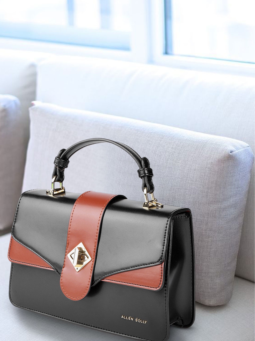 

Allen Solly Black & Maroon Solid Satchel