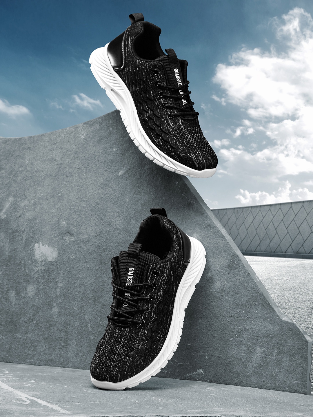 

Roadster Men Black Woven Design Running Shoes