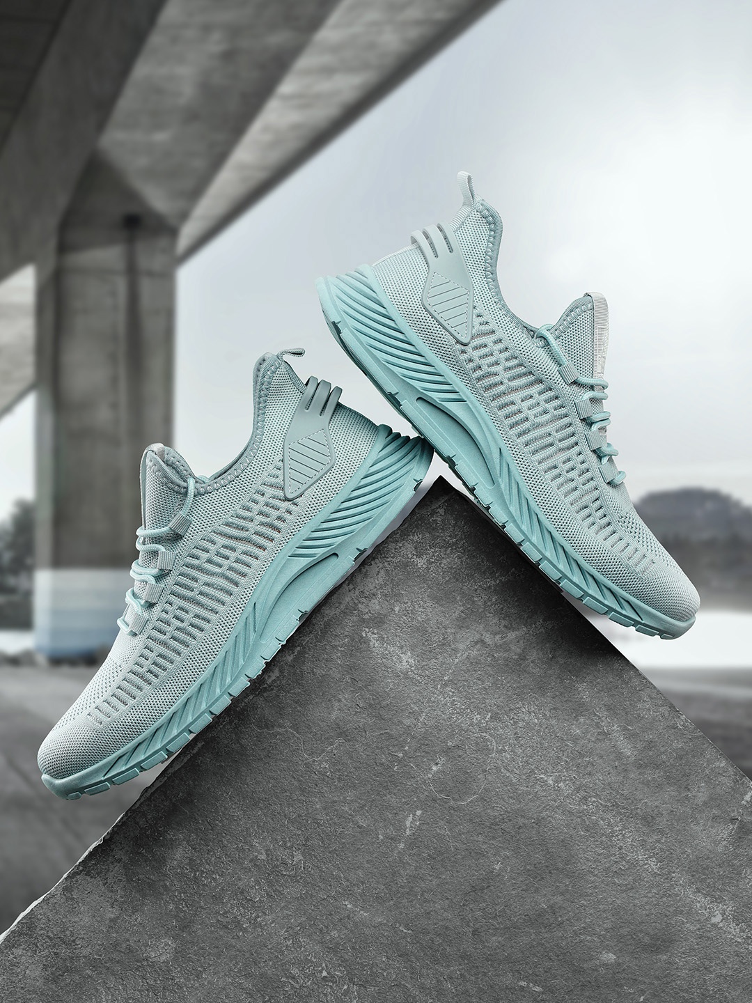 

Roadster Men Powder Blue Woven Design Running Shoes