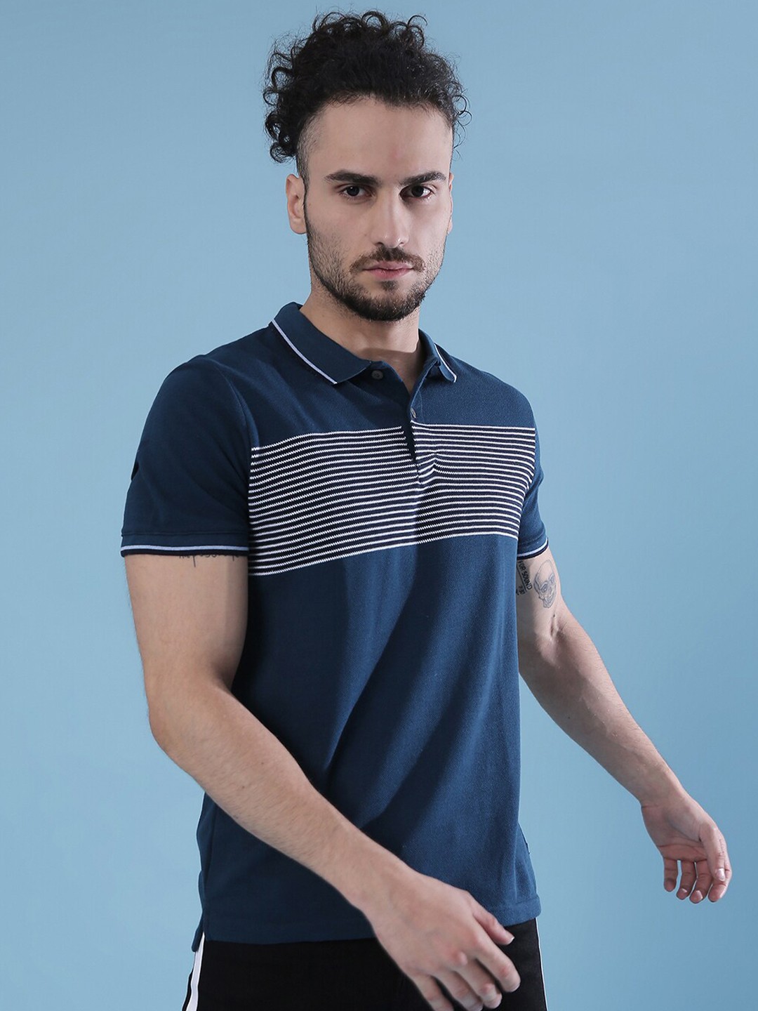 

Campus Sutra Men Blue Striped Polo Collar T-shirt