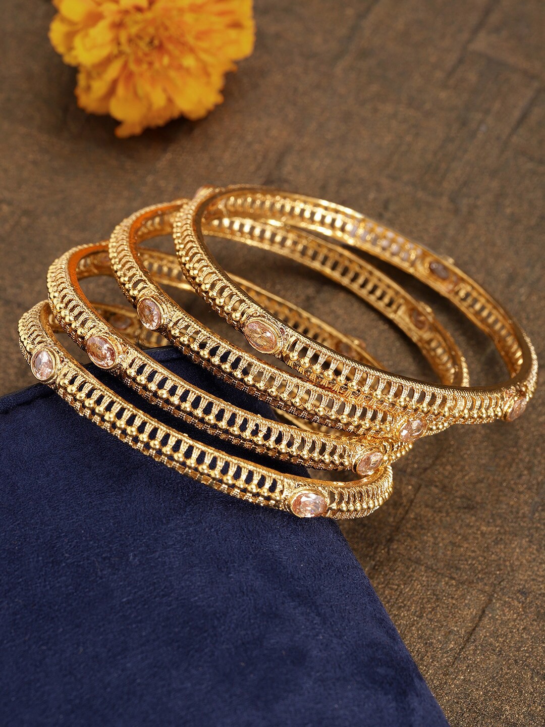

Priyaasi Set Of 4 Gold-Plated White Stone-Studded Bangles