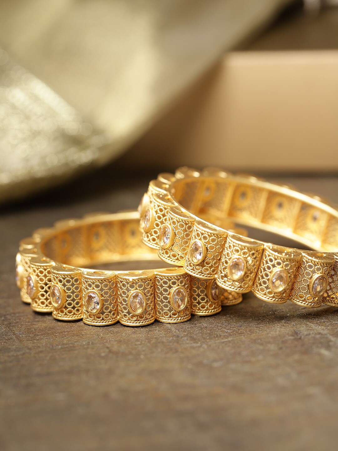 

Priyaasi Set Of 2 Gold-Plated Stones Studded Jali Work Bangles