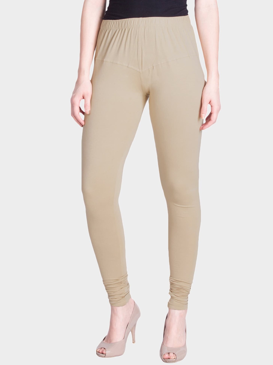 

LYRA Women Beige Solid Snug-fit Churidar-Length Leggings