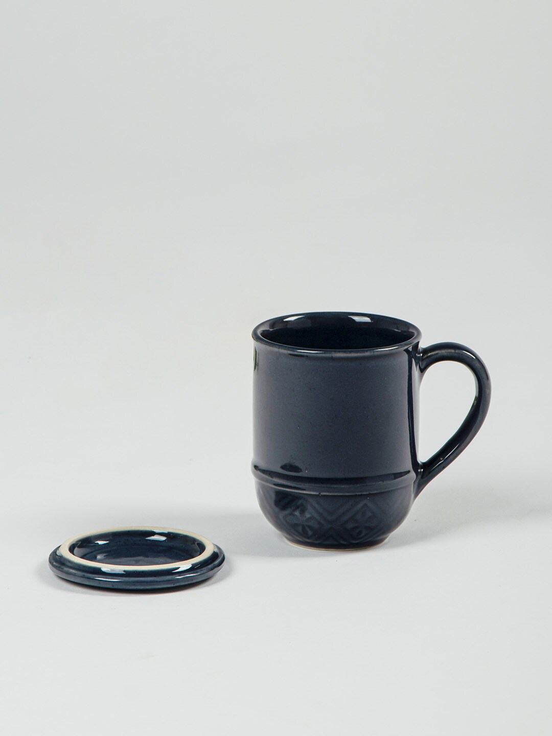 

Fabindia Blue Ceramic Embossed Glazed Coffee Mug with Lid