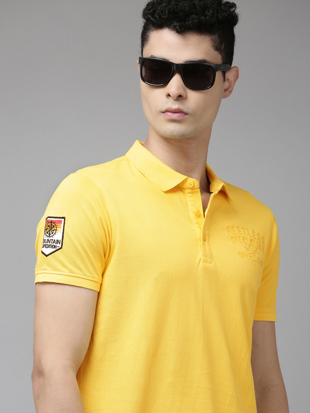 

SPYKAR Men Yellow Solid Polo Collar Pure Cotton Slim Fit T-shirt with Minimal Print Detail