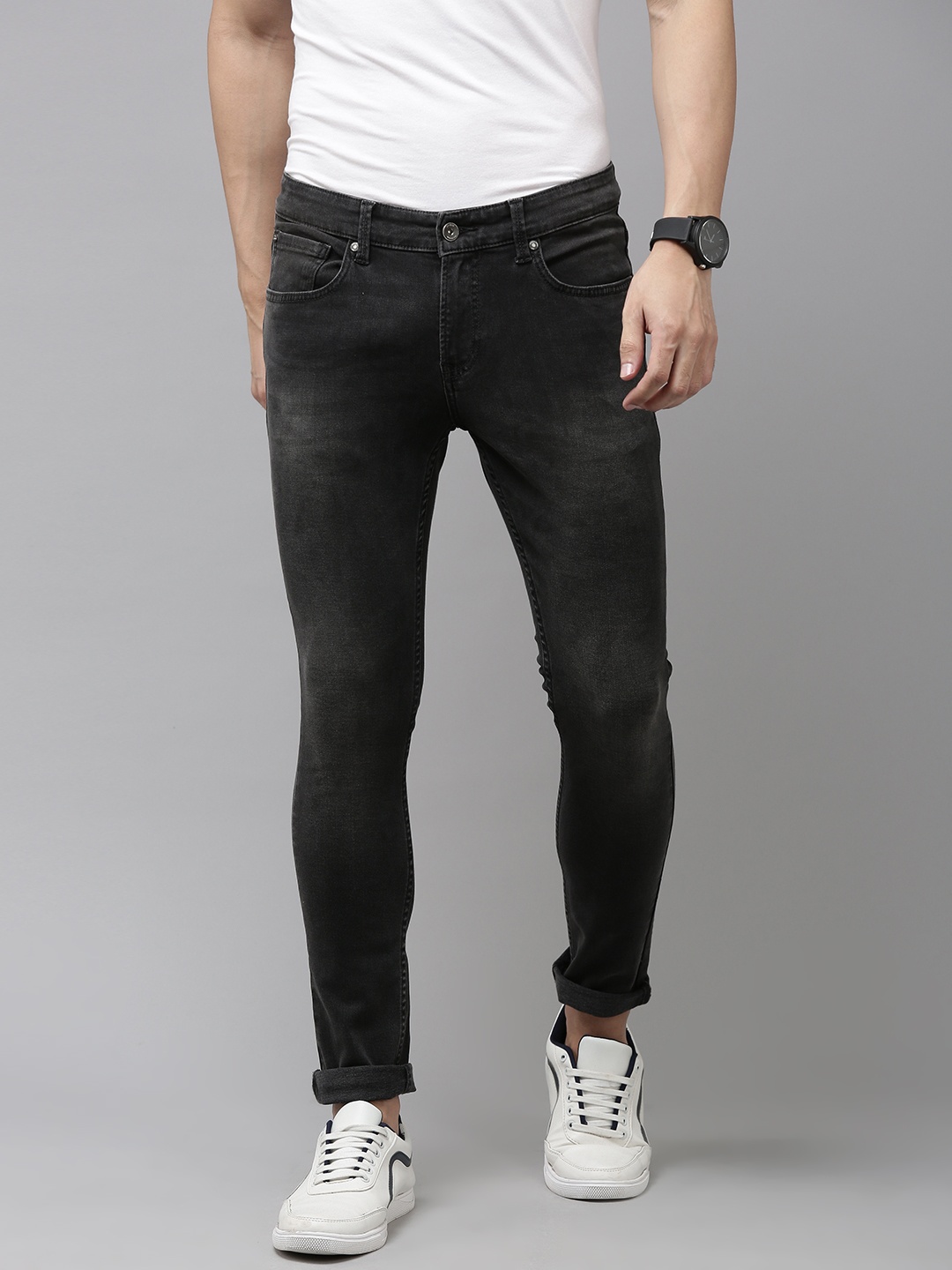 

SPYKAR Men Black Super Skinny Fit Low-Rise Tapered Leg Light Fade Stretchable Jeans