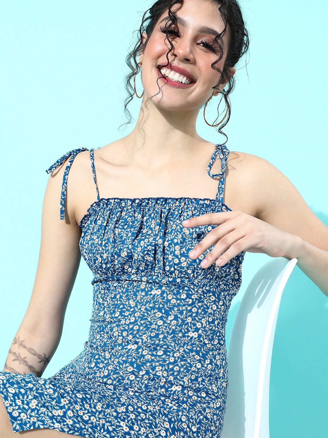 

Berrylush Women Blue & White Floral Ruched Mini Empire Dress