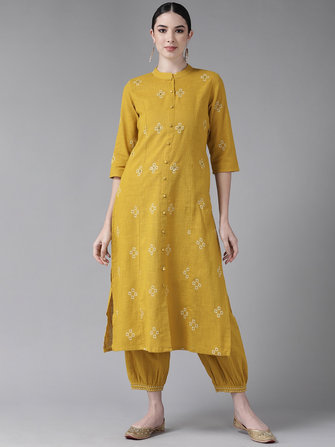 

Ishin Women Mustard Yellow Ethnic Motifs Embroidered Mirror Work Pure Cotton Kurta with Salwar