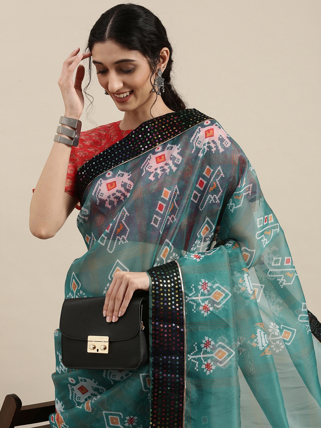 

SHAVYA Turquoise Blue Ethnic Motifs Sequinned Organza Saree