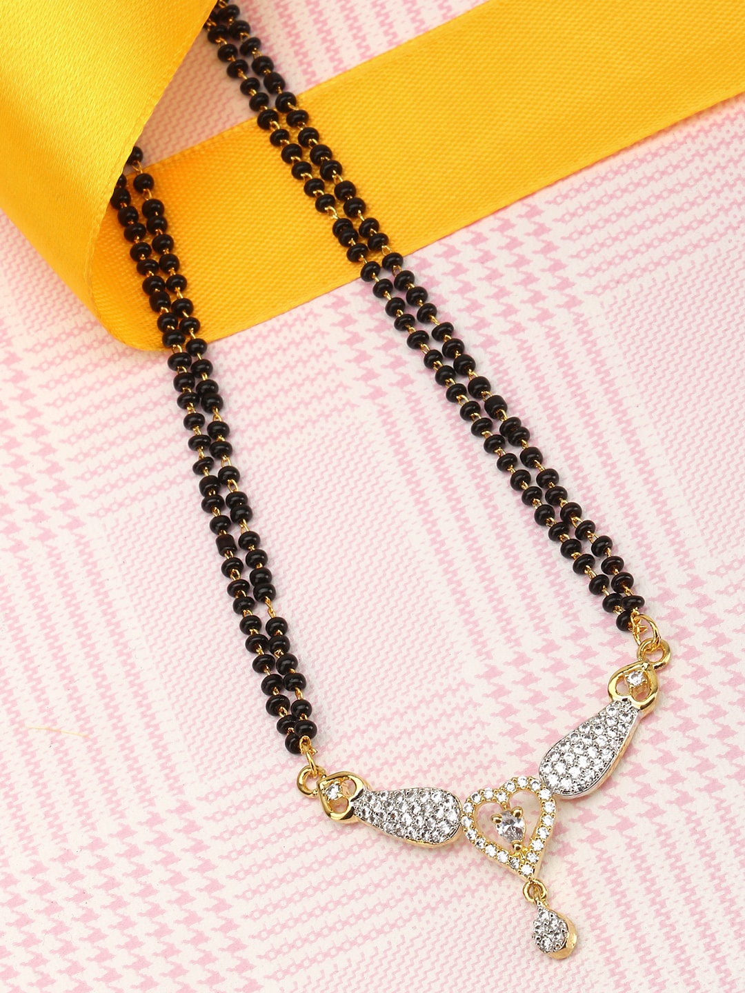 

Adwitiya Collection Gold-Toned AD Stone-Studded Black Beads Beaded Mangalsutra