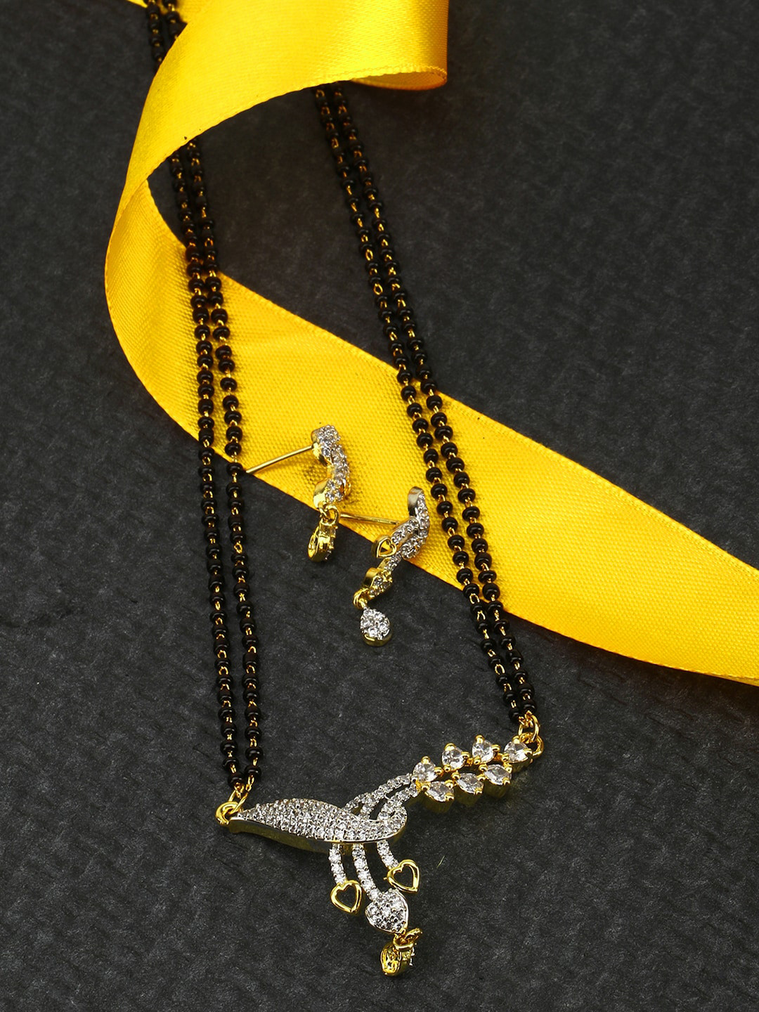

Adwitiya Collection Women Black & Gold-Toned Black Beaded Chain Mangalsutra