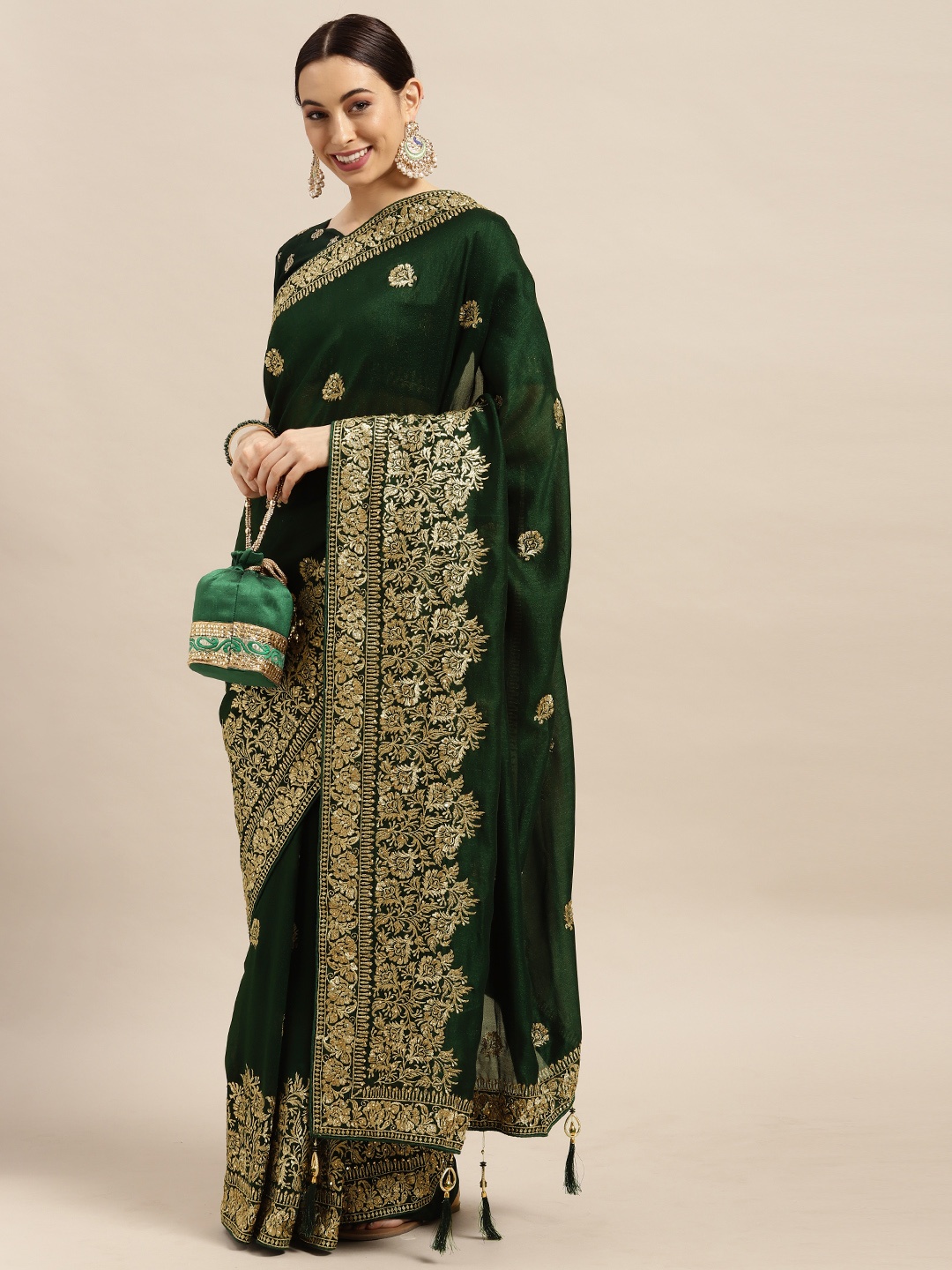 

Mitera Green Ethnic Motifs Silk Blend Saree